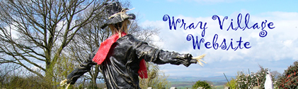 scarecrow looking at wifi mast and wray village